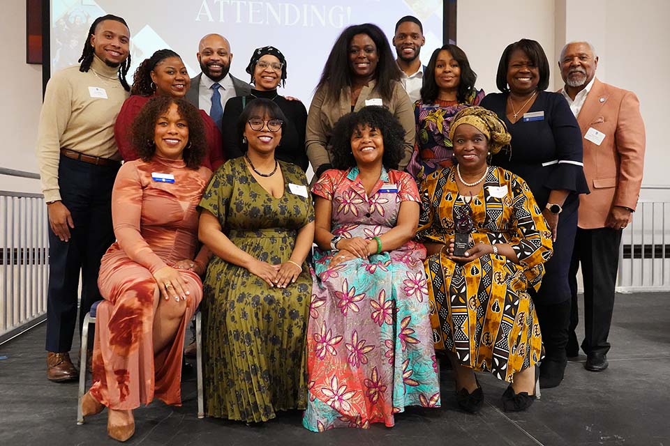 Members of the Black Alumni Association Board pose for a photo.