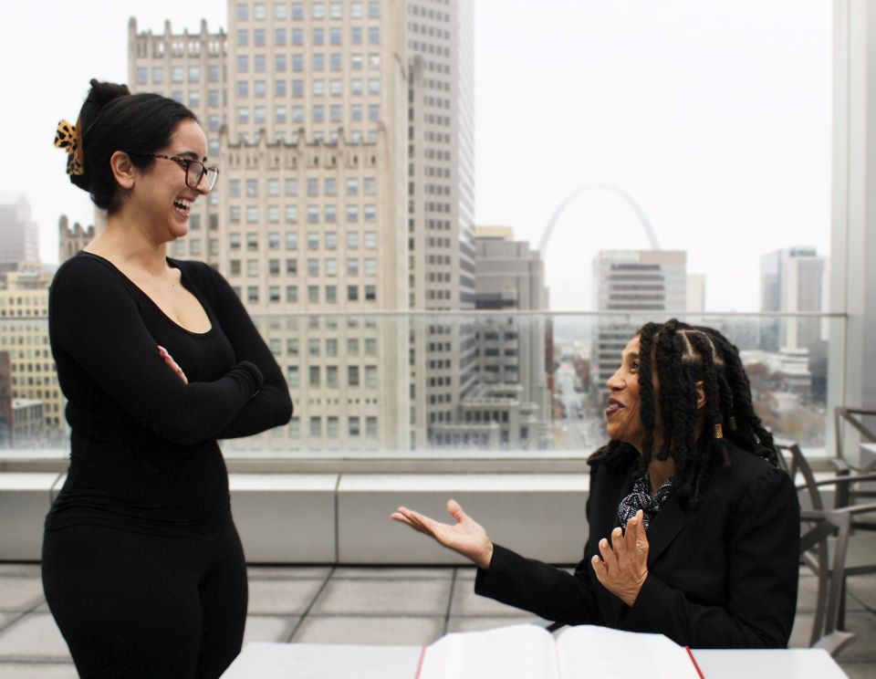 Professor Marsha Griggs talks with a student on the pavilion at Scott Hall Professor Marsha Griggs talks with a student on the pavilion at Scott Hall
