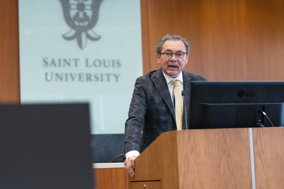 Professor Kevin Johnson speaks at the podium in the courtroom at Scott Hall for the annual Childress Lecture Professor Kevin Johnson speaks at the Childress Lecture